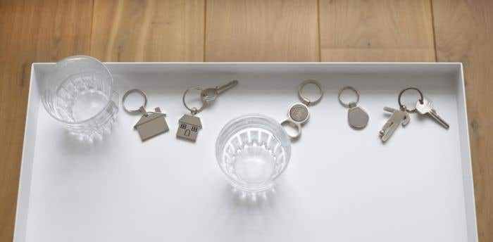 Sleutelhanger / flesopener Money